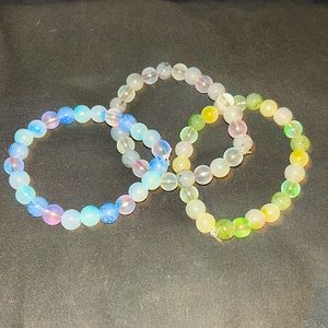 Set of black, blue, and green bracelets